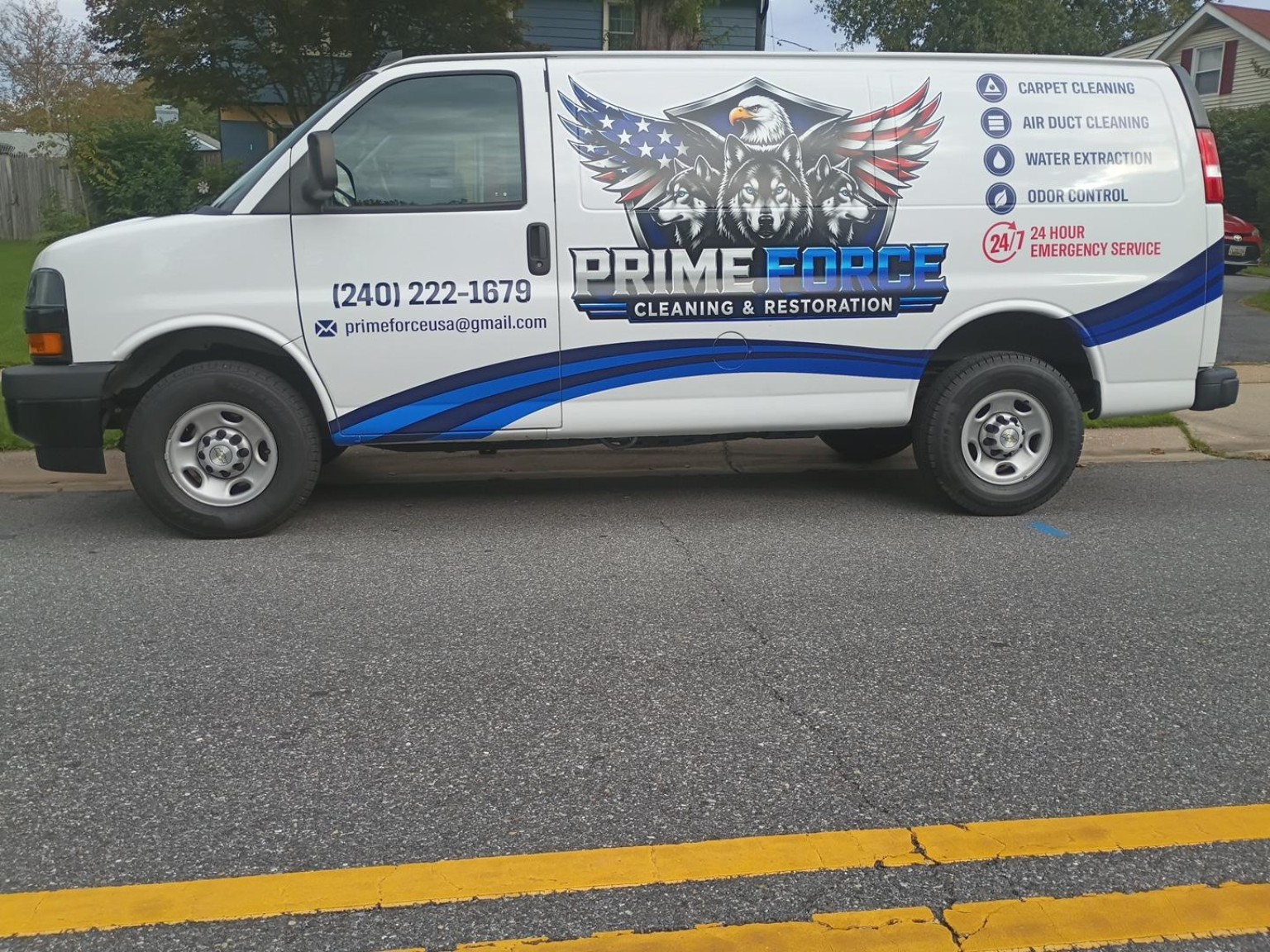 Prime Force Cleaning and Restoration service van, wolf and eagle side